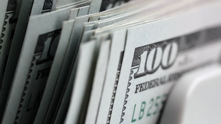 Money counting machine bank automatic equipment close up. Macro view counter counting 100 bills american dollars currency slow motion. Money concept. Business finance. Cash money. 