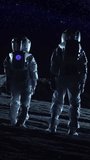 Two Astronauts in Space Suits Standing on the Alien Planet Look at Dark Sky. Space Travel, Habitable World and Colonization Concept. Video Footage with Vertical Screen Orientation 9:16