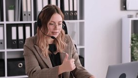 Call Center Agent Talking With Client In Office