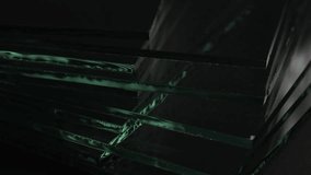 Sheets of Factory manufacturing tempered clear float glass panels cut to size. - Powered by Shutterstock - Get 15% off with code: PIKWIZARD15