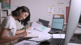 Asian Graphic designer working in office. Designing logo Artist Creative Designer Illustrator Graphic Skill Concept. - Powered by Shutterstock - Get 15% off with code: PIKWIZARD15