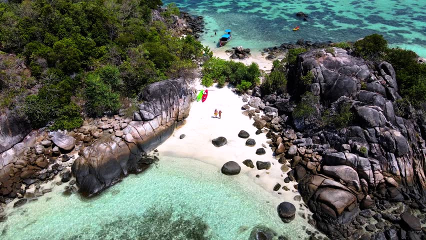 Aerial View Of Couple Walking At The Shore Of Kla Island Koh Lipe Thailand A Small Island On The Coast Of Ko Lipe With A Coral Reefs Royalty-Free Stock Footage #3462499197