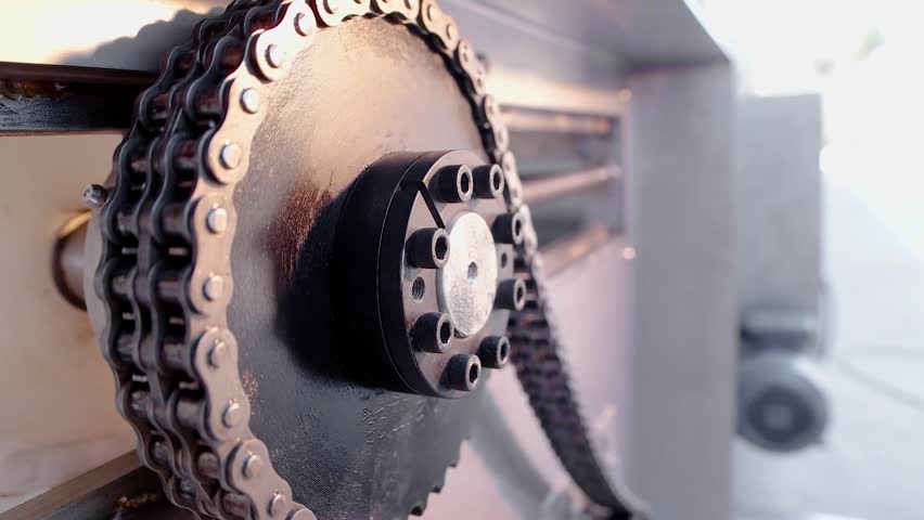 Metal pulley belt and gears with chain turning. Close up. Slow motion Royalty-Free Stock Footage #34626607
