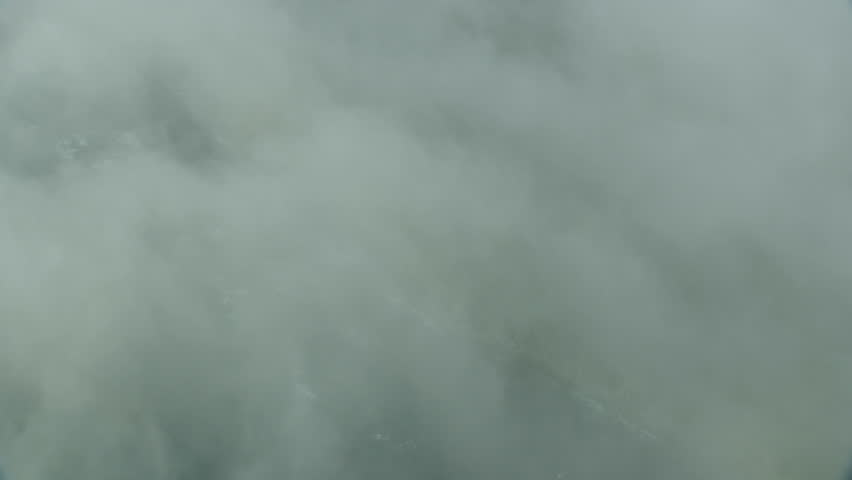Aerial view coastal sea fog over Big Sur rugged coastline Pacific Ocean California USA RED WEAPON