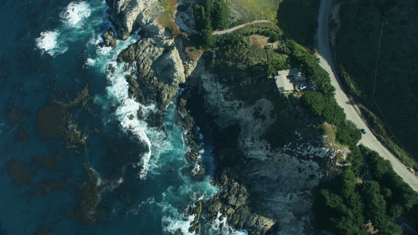 Aerial view along Big Sur rocky coastline and Cabrillo Highway coast road from Kaiser Point California USA RED WEAPON