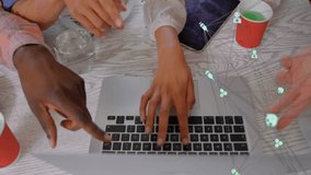 Animation of network of connections with icons over diverse colleagues using laptop. Business, technology and digital interface concept digitally generated video. - Powered by Shutterstock - Get 15% off with code: PIKWIZARD15
