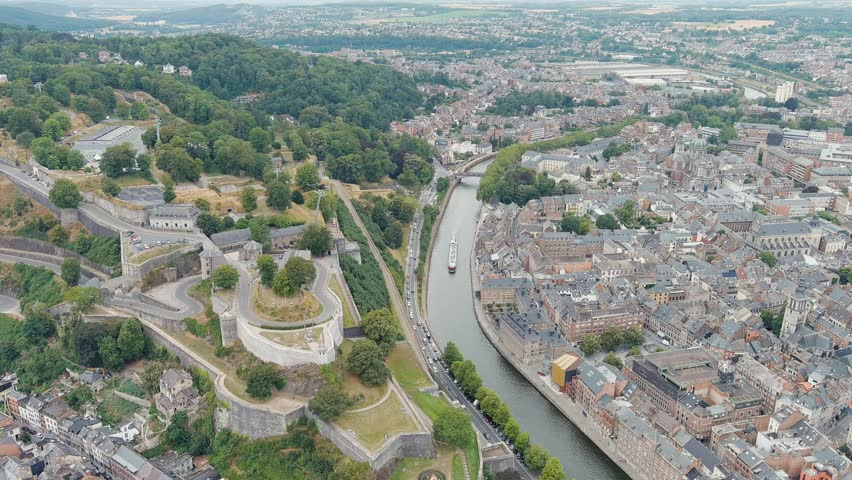 Namur, Belgium. Citadelle de Namur - 10th-century fortress with a park, rebuilt several times. Panorama of the central part of the city. River Meuse. Summer day, Aerial View, Point of interest
