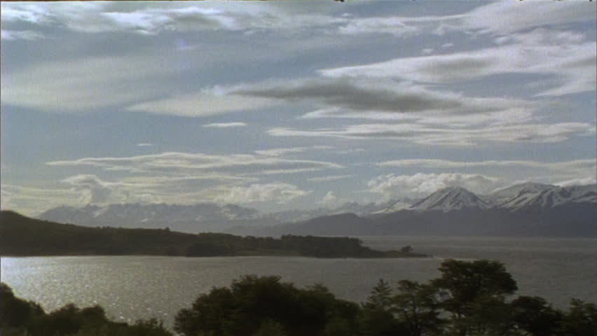 Timelapse of clouds moving over mountains 