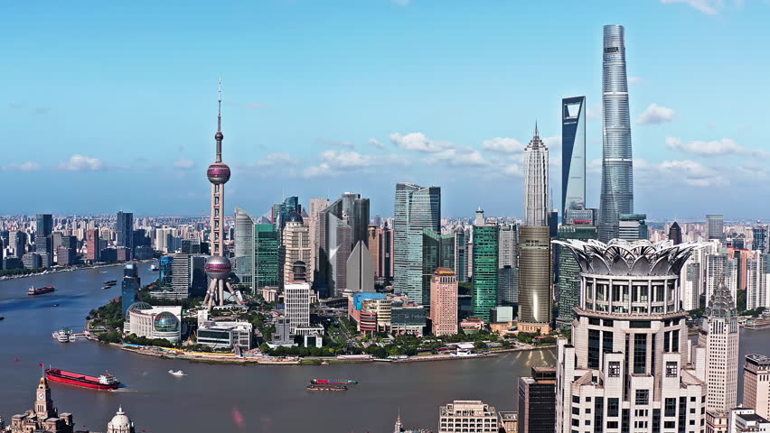 Aerial video of modern city commercial buildings and skyscrapers scenery in Shanghai. Drone surround shooting.