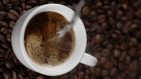 Pouring hot water in white cup with instant coffee. Vertical video - Powered by Shutterstock - Get 15% off with code: PIKWIZARD15