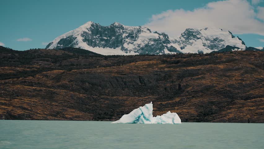 Distant View Of Iceberg On Lake Argentino, Los Glaciares National Park, Santa Cruz Province, Patagonia, Argentina. Wide Shot Royalty-Free Stock Footage #3463123711