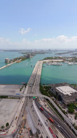 Vertical aerial video Macarthur Causeway from Downtown Miami to beach Royalty-Free Stock Footage #3463259159