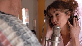 Creative Process: Singer and Guitarist Recording Song at Home - Powered by Shutterstock - Get 15% off with code: PIKWIZARD15