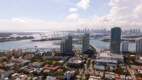 60p aerial Miami approaching port and bridges