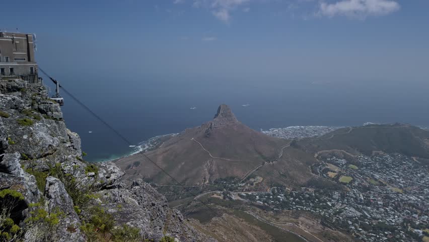 Cable transport aerial drone view at south african Table Mouintain viewpoint landscape, flying panoramic