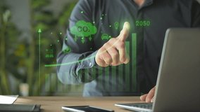 green energy zero emission carbon co2 reduction graph charts,business man at laptop computer using virtual touch screen to show alternative energy growth - Powered by Shutterstock - Get 15% off with code: PIKWIZARD15