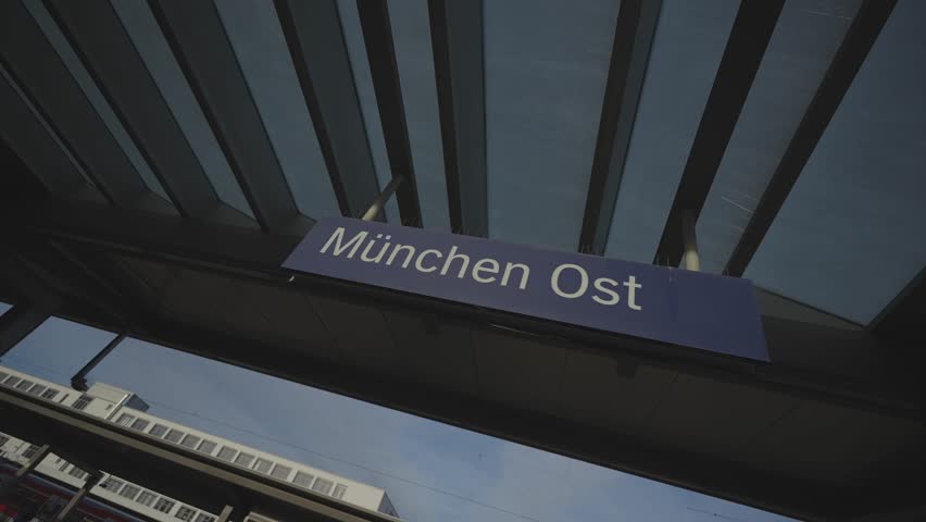 Munchen Ost or Ostbahnhof. Munich eastern railway station. Platfoms of railroad station Ost bahnhof. Munich East train station. Bahnhof Munchen Ost. Railroad and public transporation in Deutschland.  Royalty-Free Stock Footage #3463449809