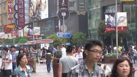 SHANGHAI - MAY 10, 2012, Crowded of tourists on pedestrian shopping Nanjing Road street
