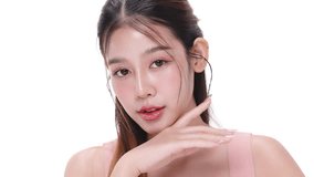 Close up portrait beautiful young Asian woman with healthy facial skin isolated over white background. - Powered by Shutterstock - Get 15% off with code: PIKWIZARD15