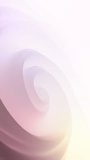 Vertical video - elegant silky satin flowing spiral in pastel colors reminiscent of pink rose petals unfurling. This romantic floral motion background is full HD and a seamless loop with copy space.