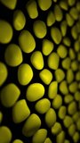 	
Vertical video - simple textured pattern background with gently morphing shiny yellow organic shapes. This abstract background texture is full HD and a seamless loop.