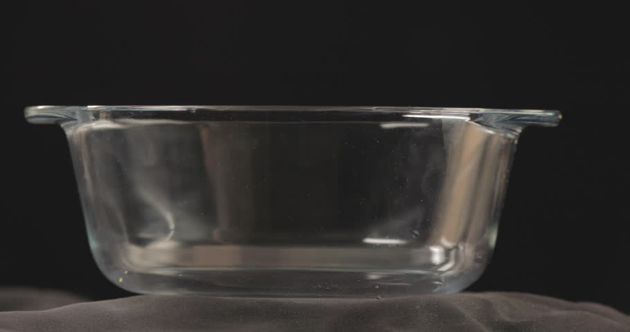 Egyptian Molokhya poured in a Bowl Glass and smoke is coming out freshly made and shot on 4K. Molokhya is a Famous Egyptian Food in the Egyptian Cuisine and well known to be the most delicious one