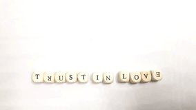 meditative, thoughtful wooden cubes with letters - Powered by Shutterstock - Get 15% off with code: PIKWIZARD15