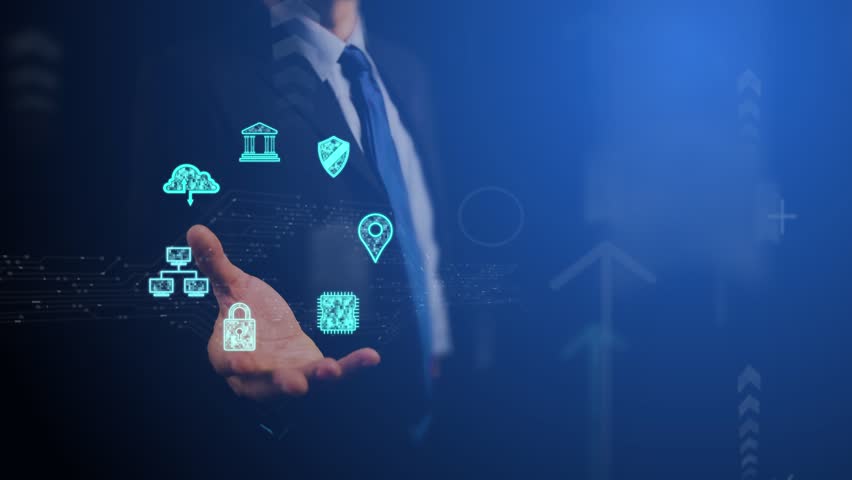 Cg Symbols of database digitalization and their protection rotate against the background of a silhouette of a business man with an open palm