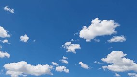 Time lapse motion background blue sky fluffy fluffy white clouds. Clouds and Blue Sky, Video quality, high definition, cumulus clouds and cirrus clouds. cumulus formation