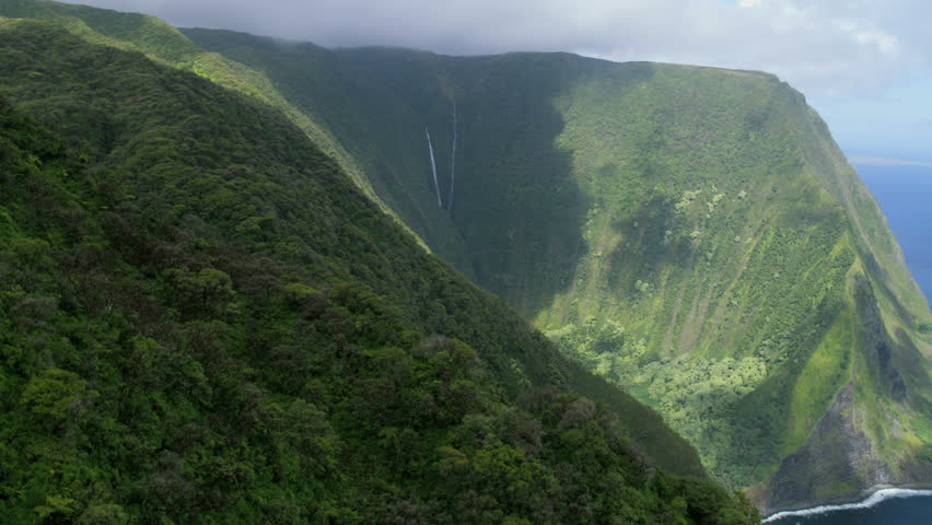 Aerial coastal view of volcanic sea cliffs Leinaaopapio Point and Okala Island Pelekunu Preserve Molokai Hawaii Polynesia USA RED WEAPON | Shutterstock HD Video #34639432
