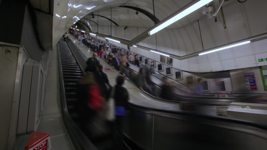 LONDON - OCTOBER 6, 2011: Time lapse of Escalators at Soho Station, London