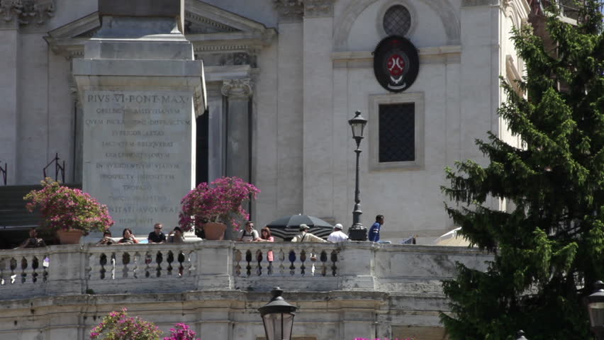 Close up of base of obelisk and Trinita dei Monti