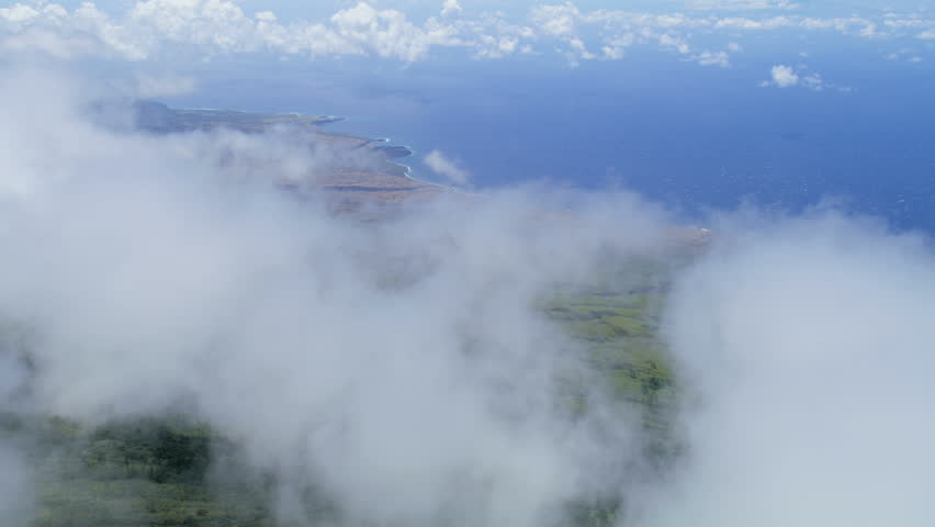 Aerial view of Haleakala National Park coastline Maui from above the clouds a tropical Hawaiian volcanic Island archipelago USA RED WEAPON