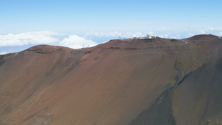 Aerial view of Haleakala crater summit observatory an extinct dormant volcano Hawaiian Island archipelago Polynesia USA RED WEAPON