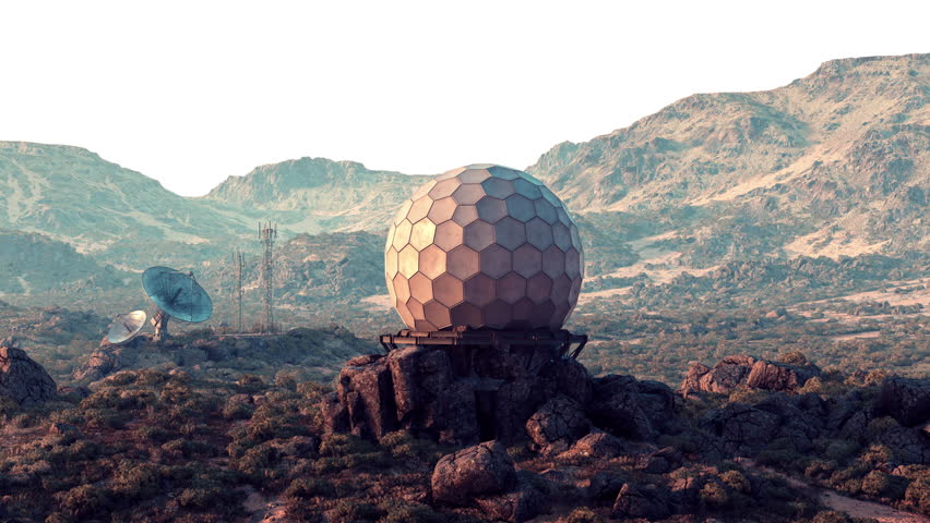 A satellite dish sitting on top of a mountain