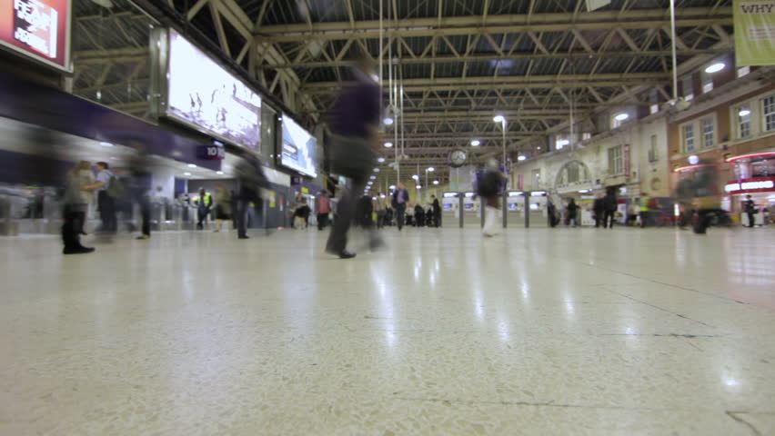 LONDON - OCTOBER 6, 2011: Time lapse of people in the underground station in