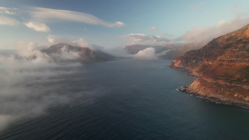 Chapman's Peak Drive At Noordhoek Bay During Sunset In Cape Town, South Africa. Aerial Pan Right Shot Royalty-Free Stock Footage #3464106055