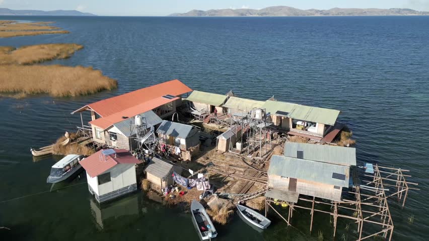 Aerial view of Uros Floating Islands on Lake Titicaca, the highest navigable lake in the world, on the border of Peru, South America.