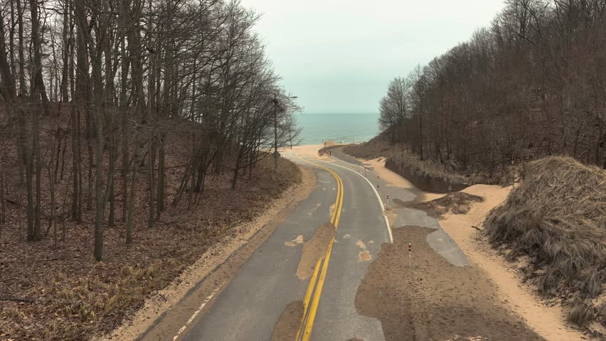 Level descending motion peaking out at the shore.