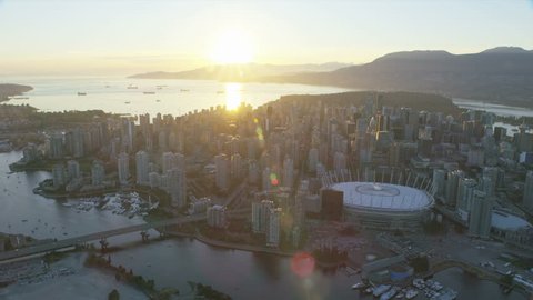 Aerial view sunset over Vancouver city skyline BC Place Edgewater Casino False Creek Burrard Inlet British Columbia Canada RED WEAPON