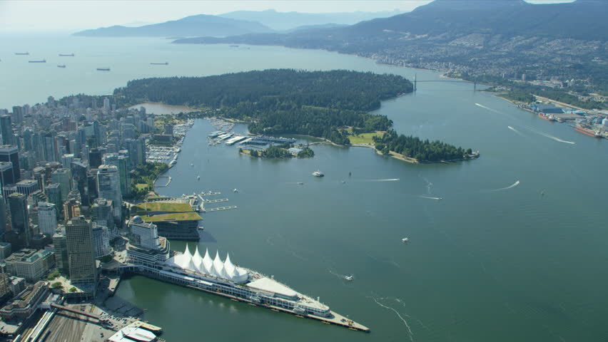Aerial view over Vancouver Harbour with Canada Place convention centre and Cruise Ship Terminal British Columbia Canada RED WEAPON
