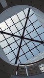 Glass ceiling in the office building, modern architecture detail. Vertical video.