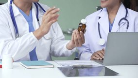 Medical team with nurses, Muslim people and Asian male doctors and specialists working together with laptops and tablets, support and wellness. listening for medical problems - Powered by Shutterstock - Get 15% off with code: PIKWIZARD15