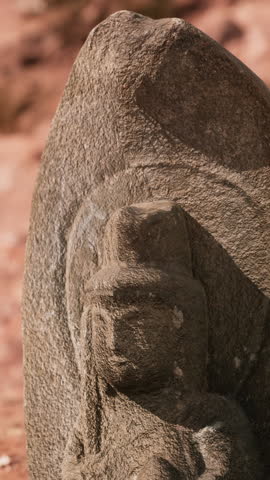 Ancient Statue on the Rocks Desert