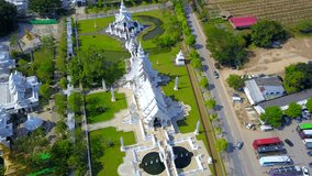 4K video resolution top view background frome drone flying over beautiful Thai Temple,home,road, at Northern Thailand.