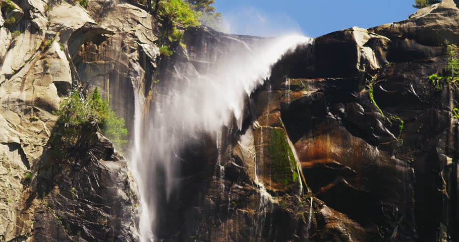 Bridalveil Fall with spectacular cascading waters and winds that shower the granite cliffs in Yosemite National Park, California.