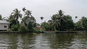 Alleppey India houseboat sailing among canals and rice fields