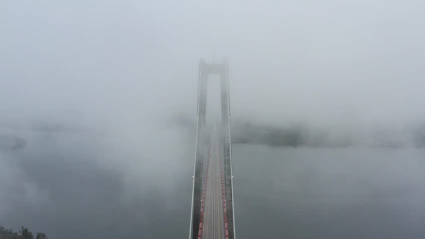Foggy Höga Kusten bridge in northern Sweden
