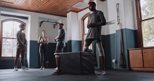 Inspiring video showcasing diverse group of people in a gym, including a man with a prosthetic leg and another with a knee brace, engaging in fitness activities and supporting each other