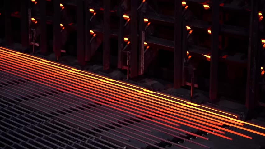 Mild steel in a steel mill. Steel production. Mechanized steel production.